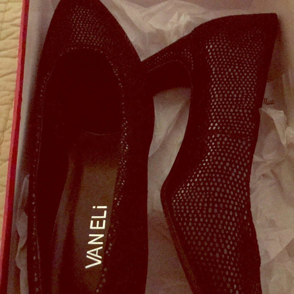 Black Vaneli heels.